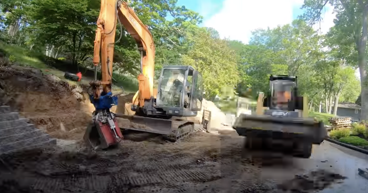 excavator overland park excavator and bobcat used to build a retaining wall